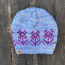 Load image into Gallery viewer, Luxury women's hand knit winter pom beanie light blue purple flowers color wool slow fashion gift