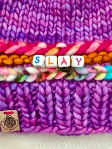 Luxury women's hand knit winter pom beanie slay purple pink teal bright fun color wool slow fashion gift