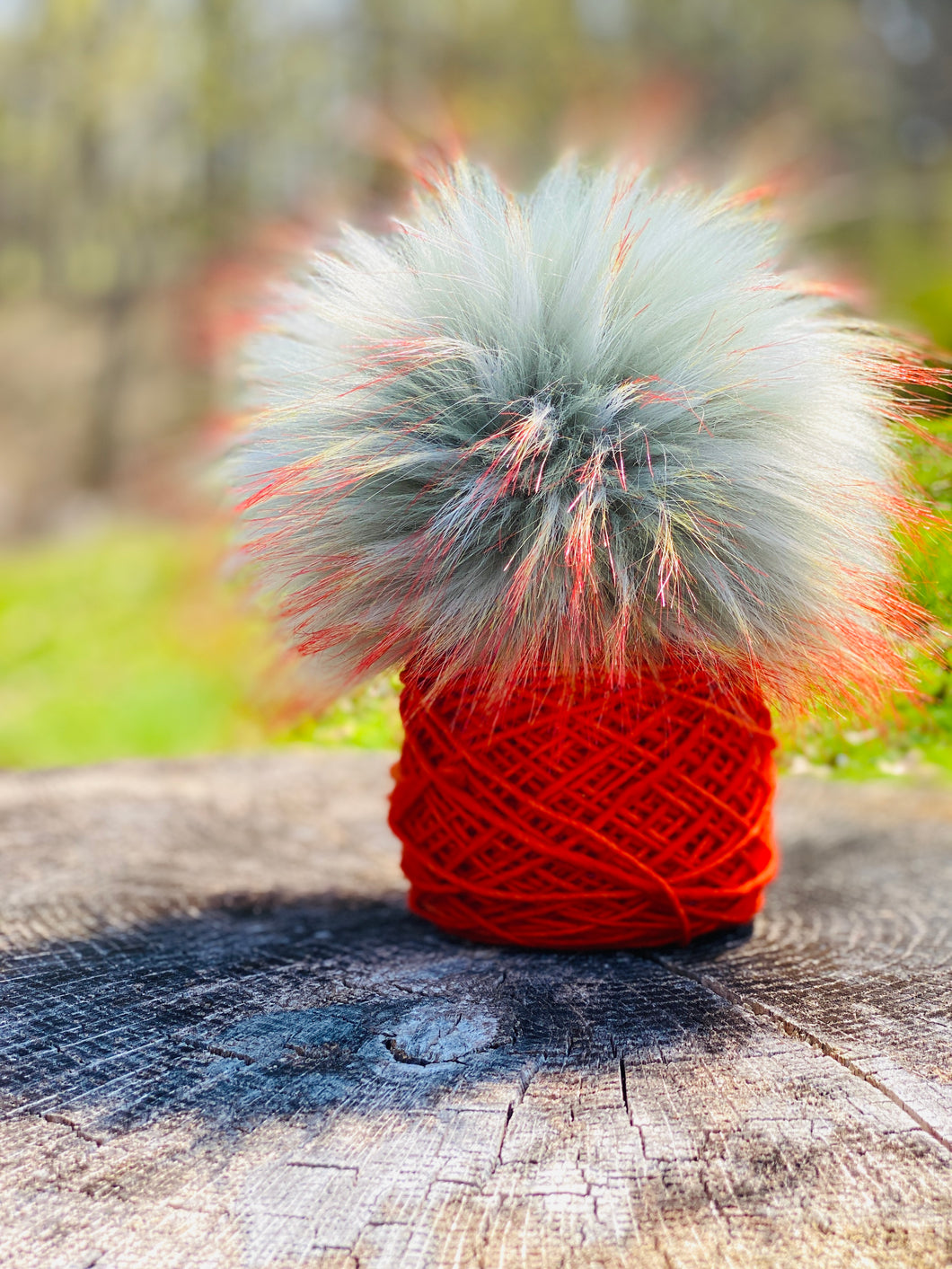 MADE TO ORDER Fun and silver sage light blue with firey long orange cream tipped tips faux fur pom pom with wooden button