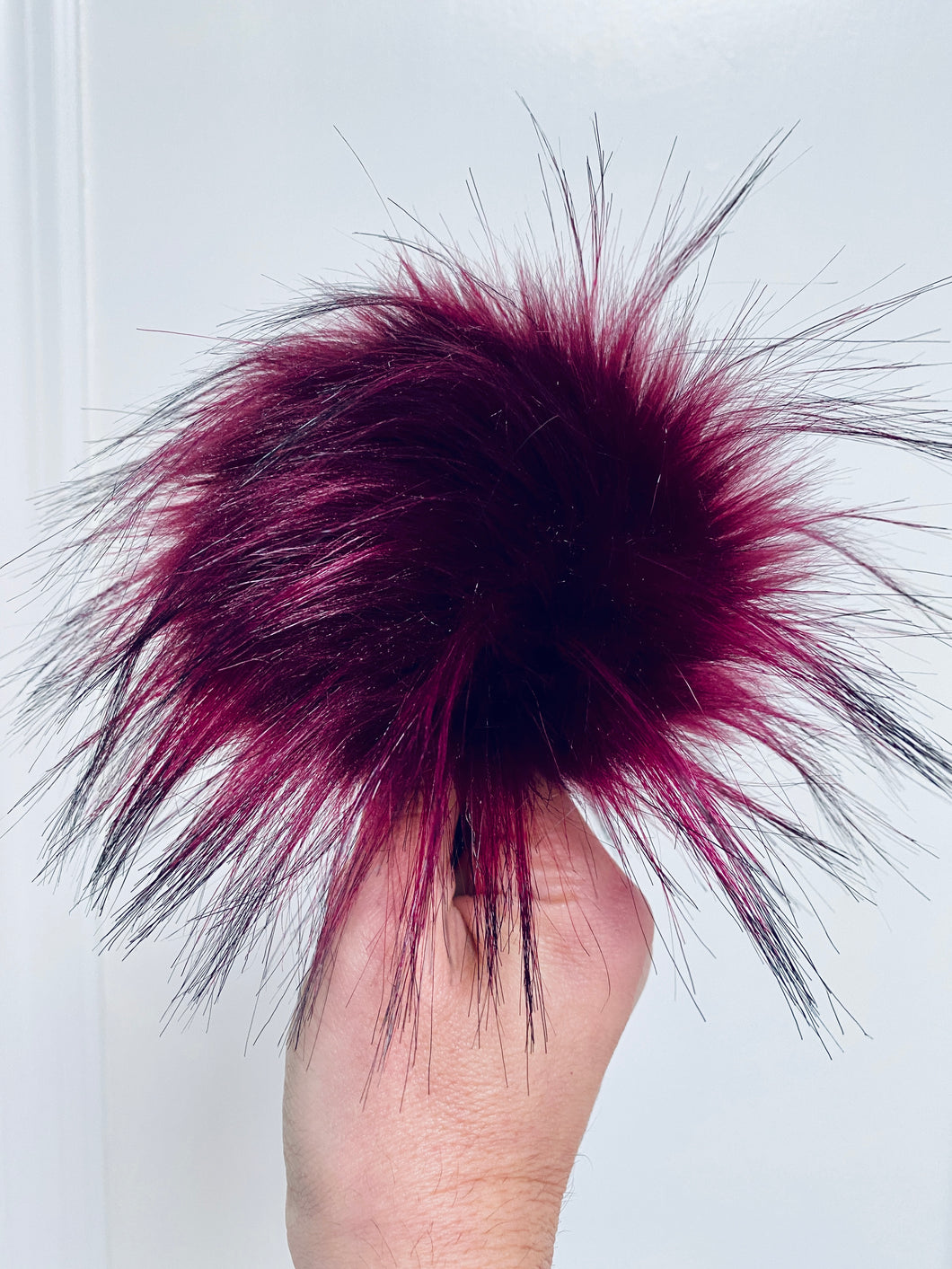 MADE TO ORDER Fun and funky merlot wine maroon with long black tips faux fur pom pom with wooden button